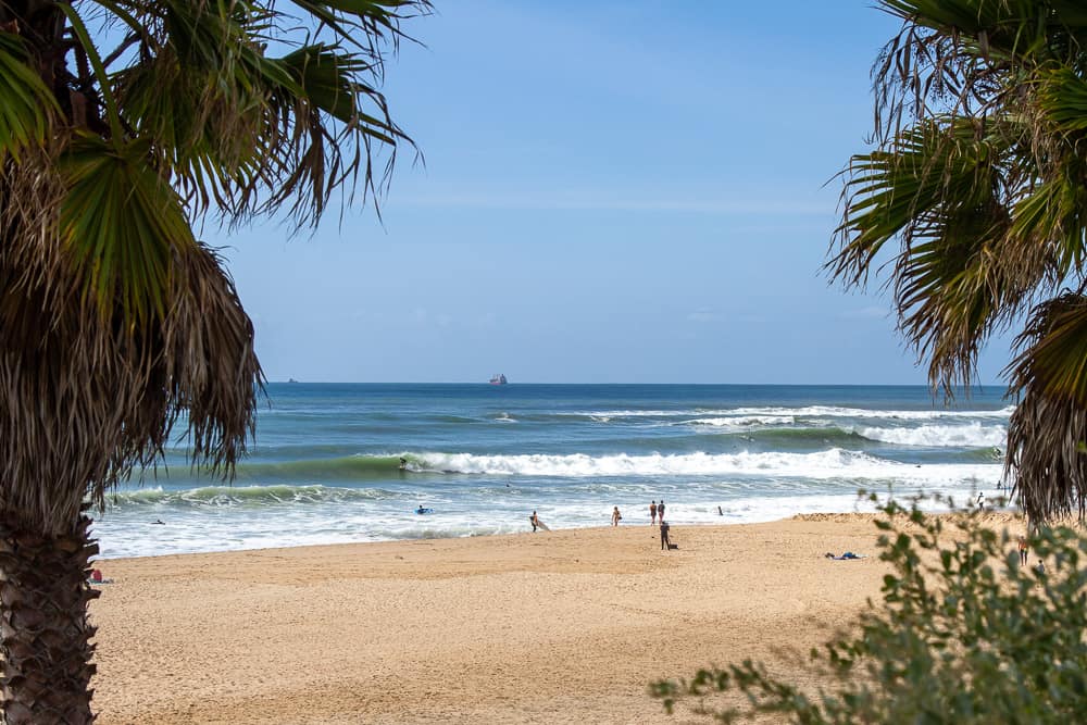 A typical day surfing the waves at Carcavelos beach
