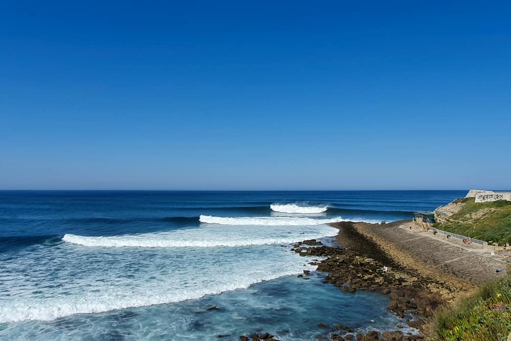 The famous righthand wave on the south side of Forte da Praia da Consolação