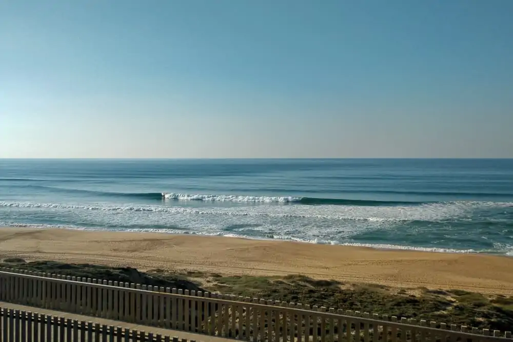 Glassy surf conditions at Praia Azul