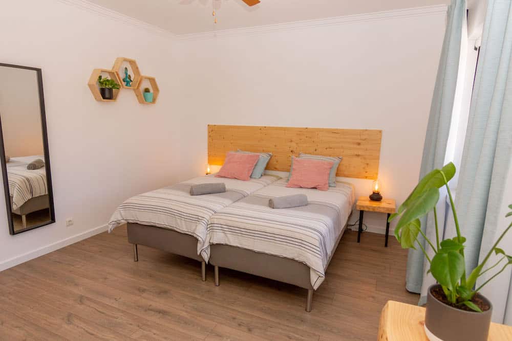 Twin beds put together to make a double bed