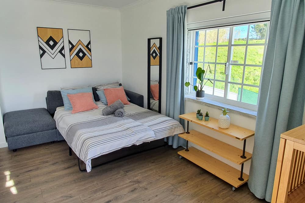 The sofa bed in the family room folded out