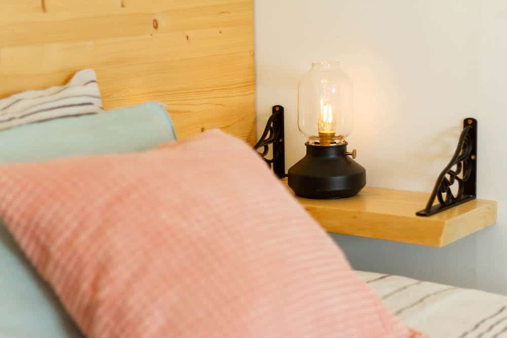Bed light with dimmer on a bedside table